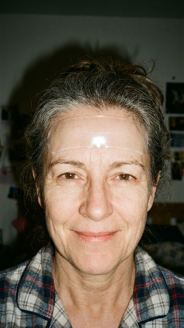 Woman wearing a RAYLIFT silicone smoothing patch